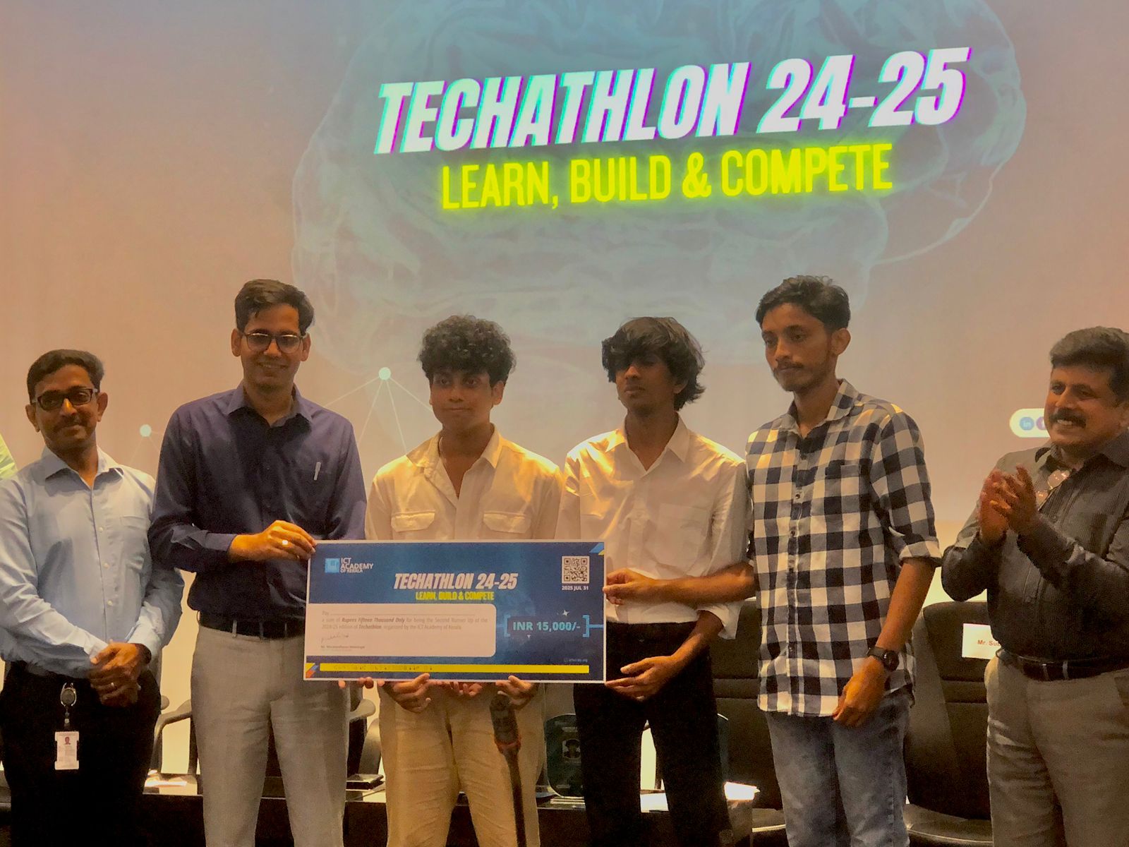 Team Rizzler receiving the award at Techathlon 24-25